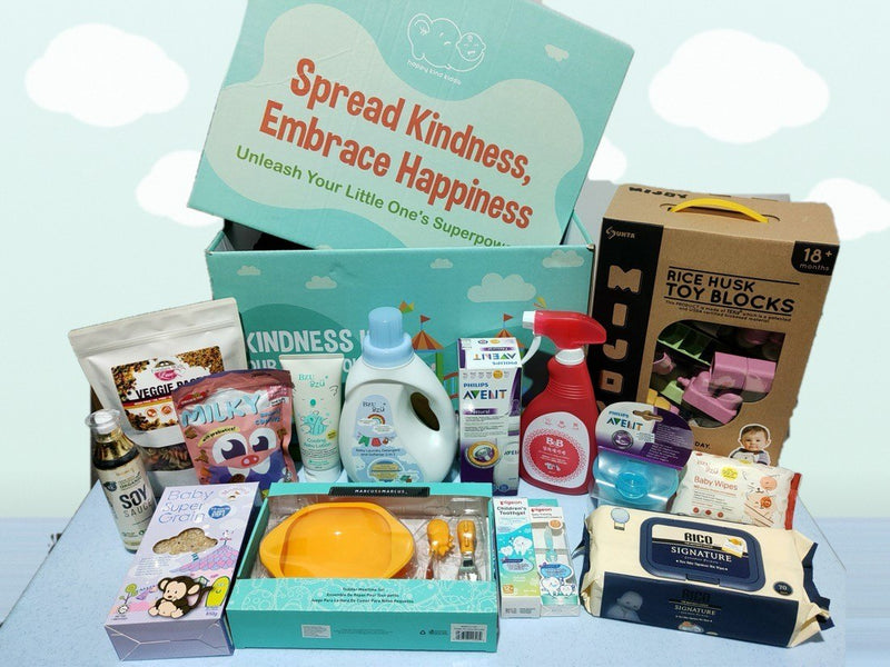 An open Happy Kind Kiddo gift box, packed by hand